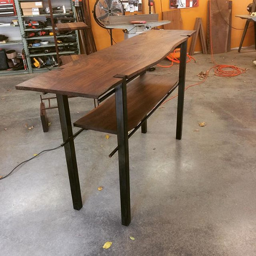 Black walnut and oil-flamed welded steel two-shelf buffet